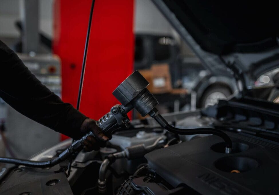 patterson nissan service on car under hood